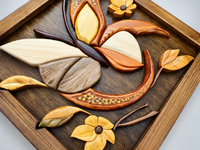 Close-up of the Butterfly in Flight design showing layered wooden wings, natural grain and hand-painted textured details.