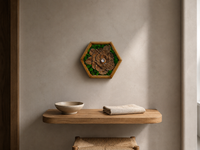 Mini Botanical Camellia displayed at its compact scale on a warm plaster wall above a slim oak shelf with a ceramic bowl and folded linen.
