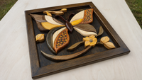 Three-quarter view of Butterfly Garden highlighting the layered relief, carved wooden forms and dark pine frame.