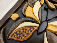 Close-up of Butterfly Garden showing layered wooden wings, natural grain and hand-painted textured details.